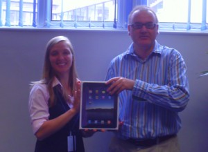 Laura Raschka, our Bristol Centre Manager presenting BE Ball Winner, Antony Portno, with his Apple iPad.