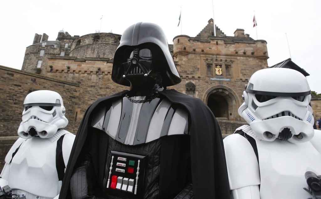 Star Wars character Darth Vader with Stormtroopers at Edinburgh Castle ahead of a screening of Star Wars Episode V The Empire Strikes Back (1980) at the Edinburgh International Film Festival.