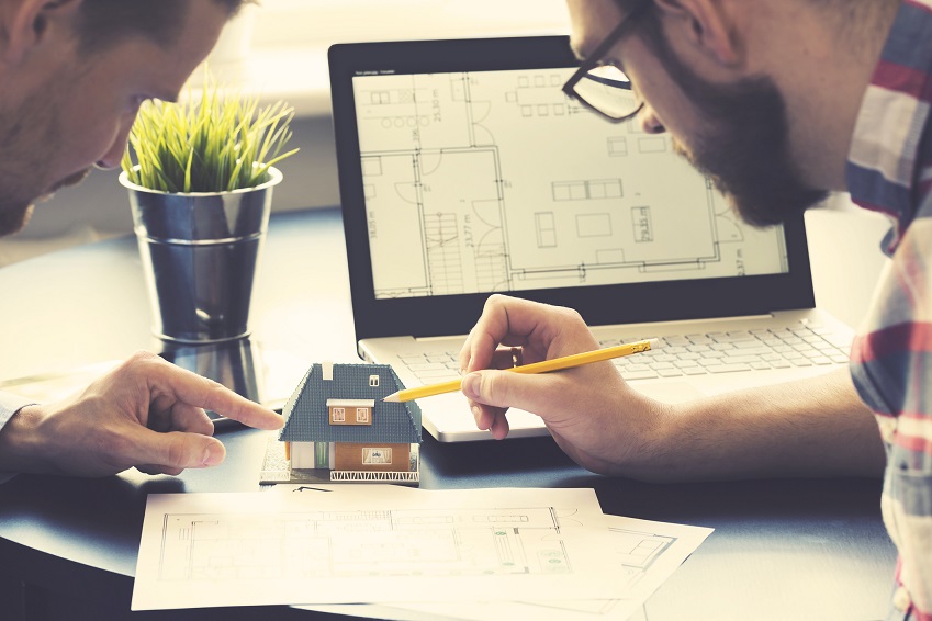 Architects studying and at work