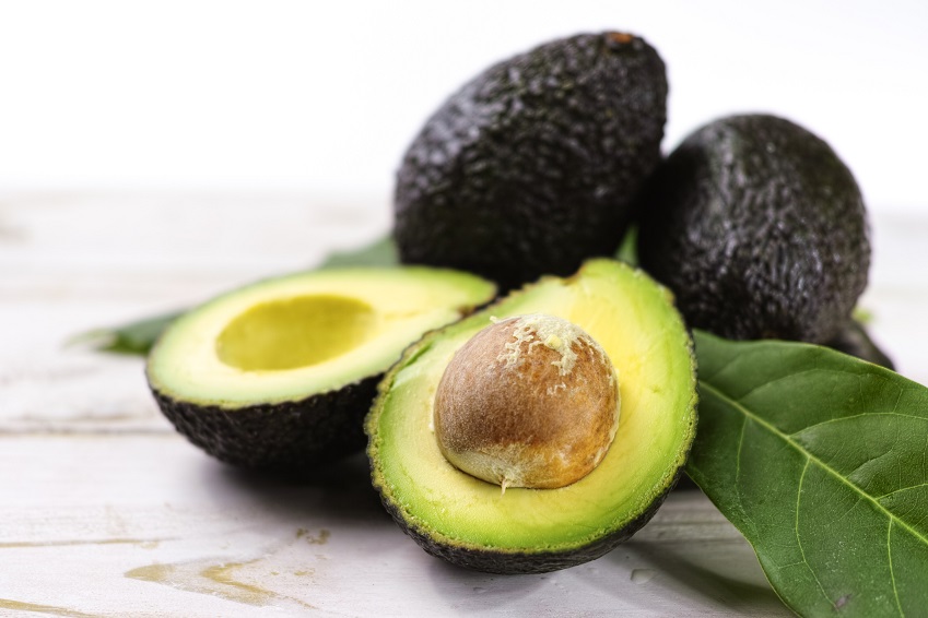 Green ripe avocado from organic avocado plantation - healthy food