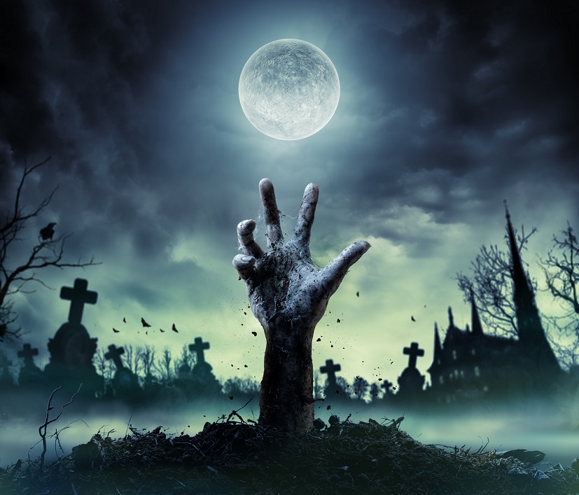 Zombie hand coming out of his grave