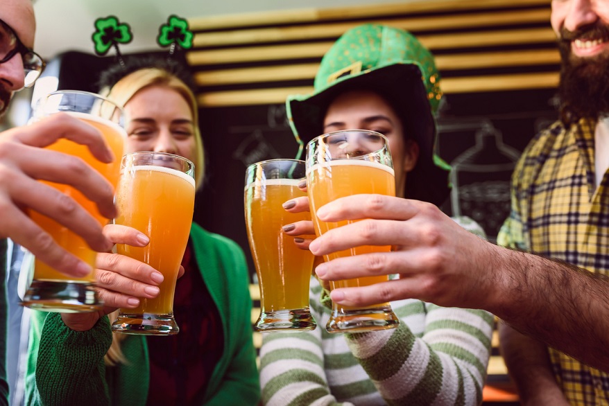 Group of Friends Celebrating St Patrick's Day at Beer Pub